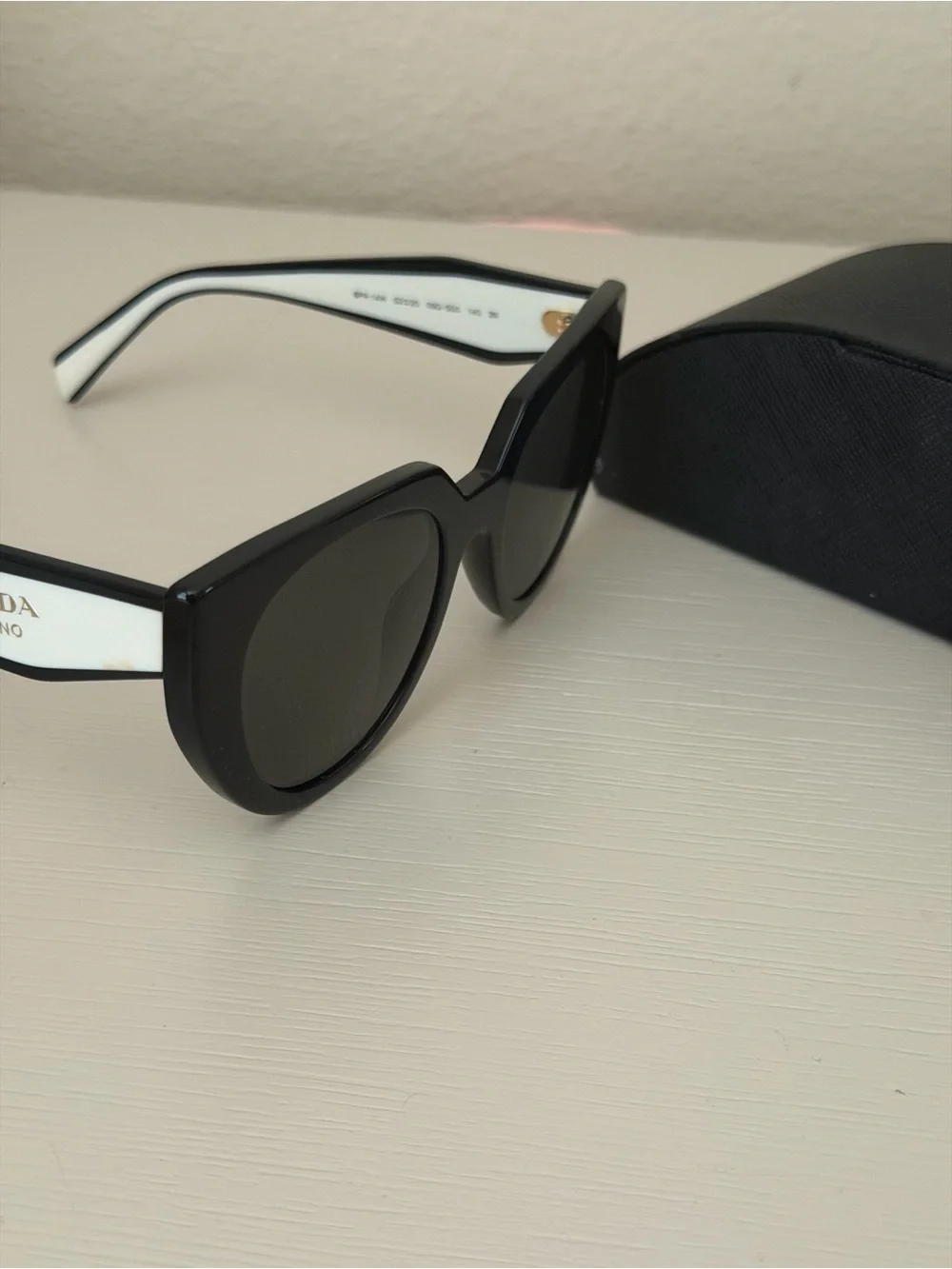 Prada Black and White Cat-Eye Sunglasses